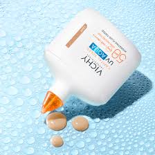 La Roche Posay Vichy Capital Soleil UV Aqua Invisible Light Tinted Fluid SPF50+ - Λεπτόρρευστο Αντηλιακό Προσώπου με Χρώμα, 50ml